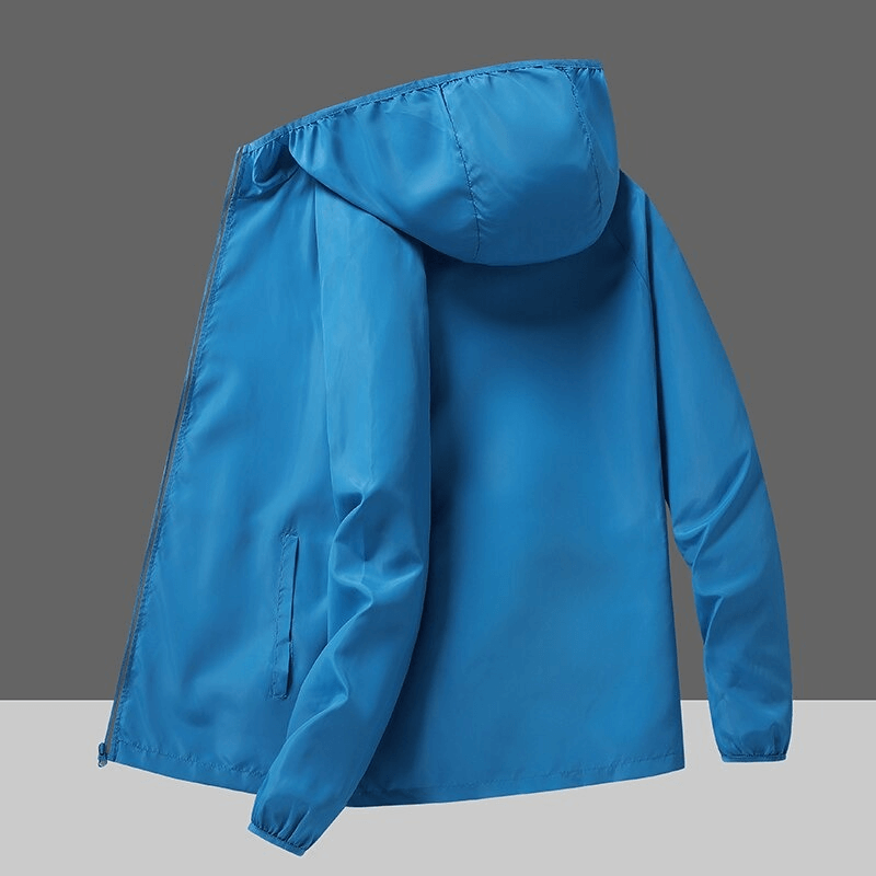 Back view of a blue waterproof reflective sun-protective women's jacket with hood, ideal for camping and hiking.